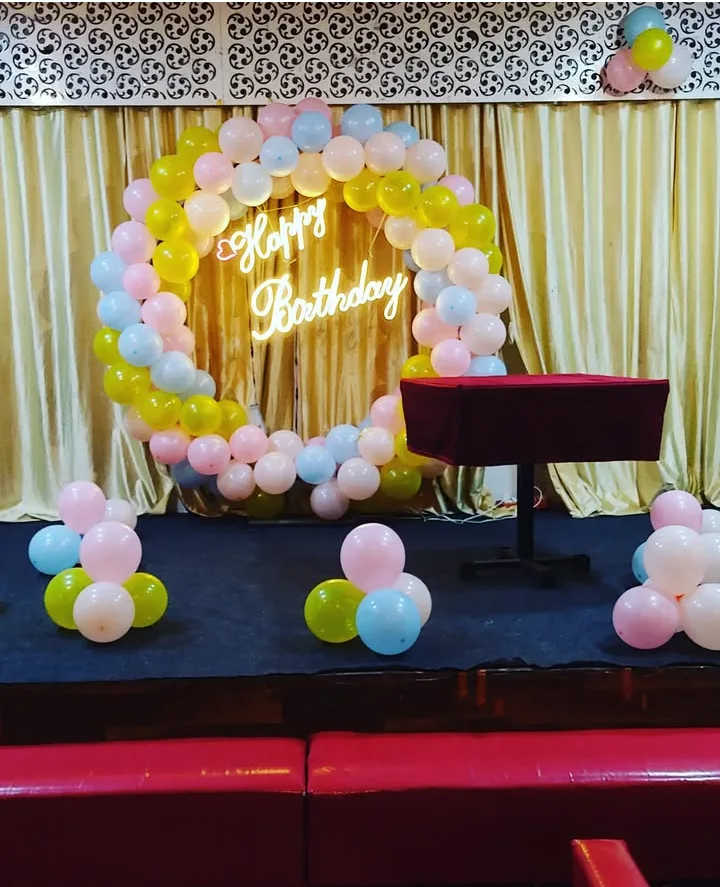 Pastel Balloon Ring with Neon Happy Birthday Sign