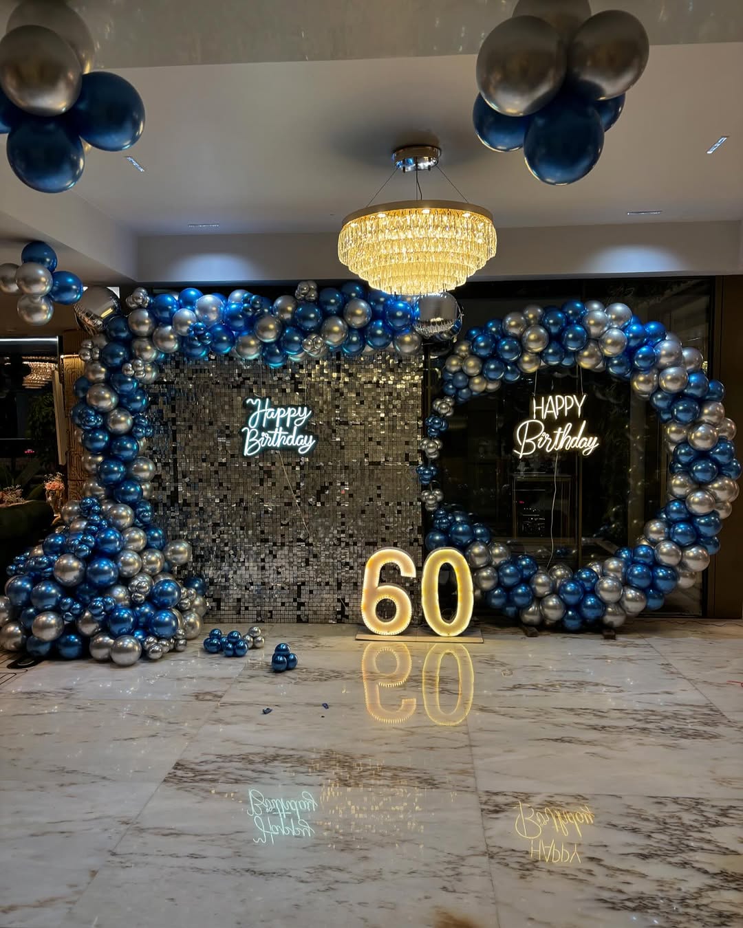 Elegant Sapphire and Silver 60th Birthday Setup