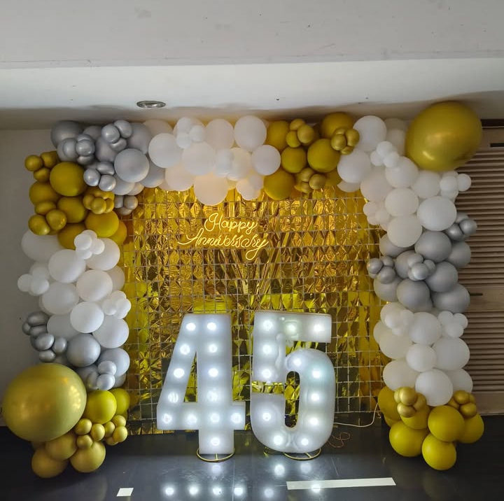 Luxurious Golden and White Anniversary Backdrop